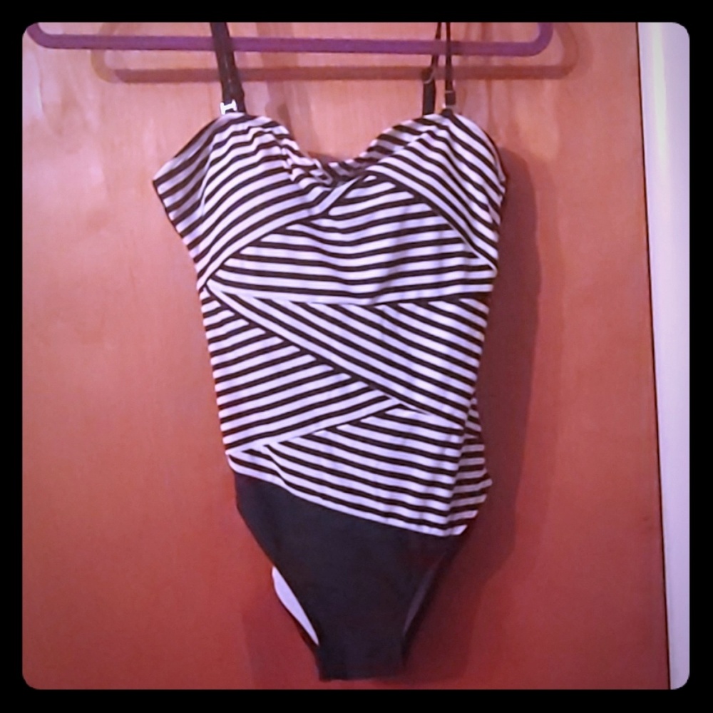 Swimsuit one piece very cute! Never worn